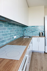 Image showing Corner Modern white blue kitchen