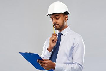 Image showing architect or businessman in helmet with clipboard