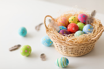 Image showing close up of colored easter eggs in basket