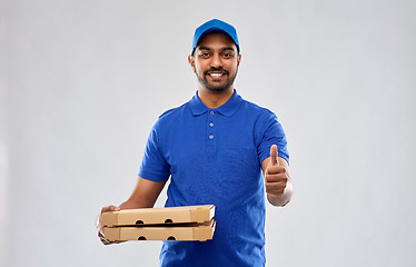 Image showing indian delivery man with pizza showing thumbs up