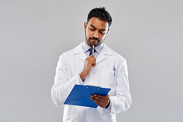 Image showing indian male doctor or scientist with clipboard