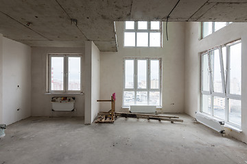 Image showing Spacious living room in a new building, with stained-glass windows and a second light