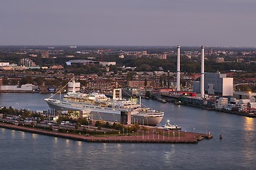 Image showing Rotterdam quay, SS Rotterdam in dusk