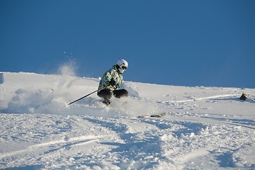 Image showing Skiing in fresh powder snow