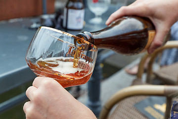 Image showing Trappist beer poured in a glass in The Netherlands