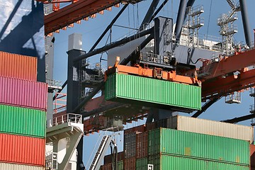 Image showing Loading containers on a ship