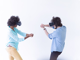 Image showing multiethnic couple getting experience using VR headset glasses