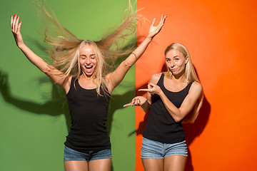 Image showing The happy business women standing and smiling