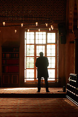 Image showing male Muslim praying in the mosque