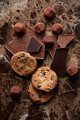 Image showing Chocolate chip cookies and chocolates