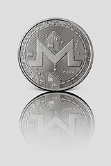 Image showing Silver coin monero on a white glossy background