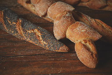 Image showing Baguette on a wooden table