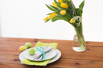 Image showing easter egg in cup holder, plates and cutlery