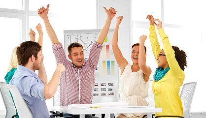 Image showing happy creative team or designers at office