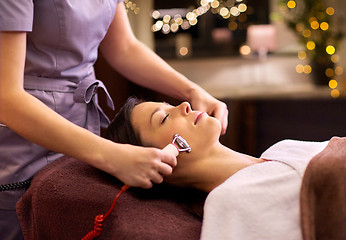 Image showing woman having hydradermie facial treatment in spa