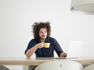 Image showing man working from home