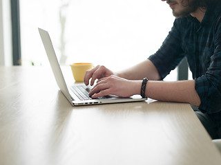 Image showing man working from home