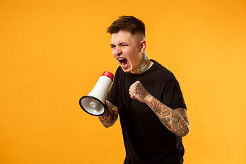 Image showing man making announcement with megaphone