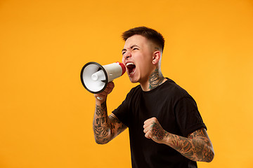 Image showing man making announcement with megaphone