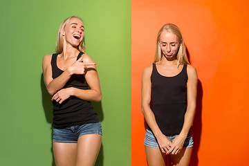 Image showing Beautiful women looking happy and unhappy