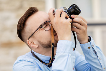 Image showing photographer or hipster with film camera outdoors