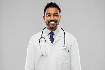 Image showing smiling indian male doctor with stethoscope