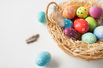 Image showing close up of colored easter eggs in basket