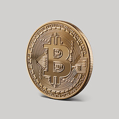 Image showing Gold Bitcoin Coin on a gray background