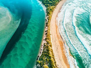 Image showing River hugs the ocean arcing aerial views