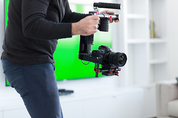 Image showing videographer at work