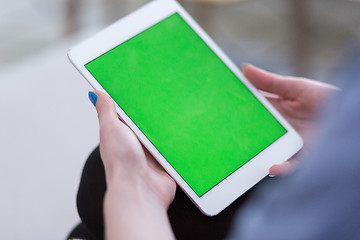 Image showing woman on sofa using tablet computer