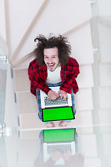 Image showing freelancer in bathrobe working from home