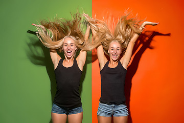 Image showing The happy business women standing and smiling