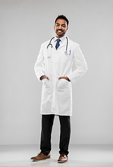 Image showing smiling indian male doctor with stethoscope