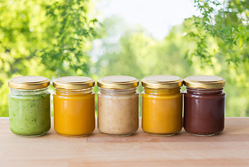 Image showing vegetable or fruit puree or baby food in jars