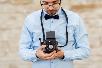 Image showing photographer or hipster with film camera outdoors