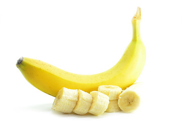 Image showing Ripe yellow banana with sliced bananas