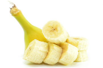 Image showing Ripe yellow banana with sliced bananas