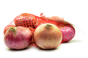 Image showing Pack of red onions isolated