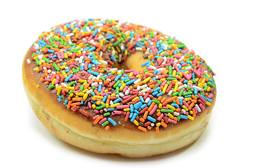 Image showing Sweet donut with rainbow candy sprinkles