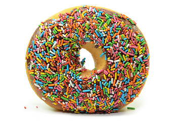 Image showing Sweet donut with rainbow candy sprinkles