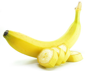 Image showing Ripe yellow banana with sliced bananas