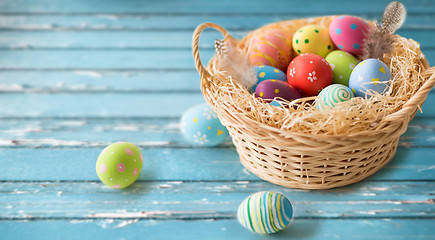 Image showing close up of colored easter eggs in basket