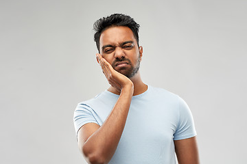 Image showing indian man suffering from toothache