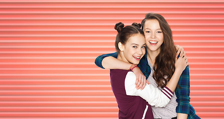 Image showing happy teenage girls or friends hugging