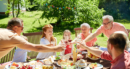 Image showing happy family having dinner or summer garden party