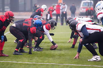 Image showing professional american football players ready to start