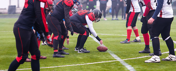 Image showing professional american football players ready to start