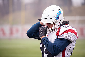 Image showing portrait of young confident American football player