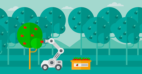 Image showing Robot picking apples at harvest time.